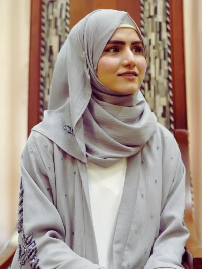 3 Piece Set Includes white inner, gray embroidered abaya, and matching gray scarf