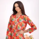 2pc Orange printed top paired with skin toned printed trousers